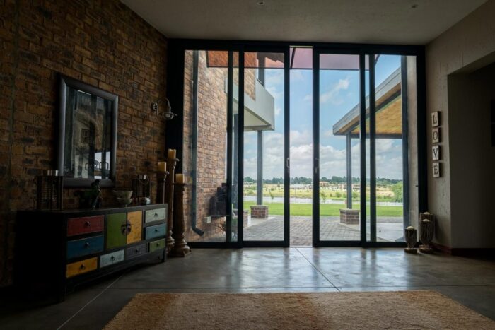 Van Acht Aluminium Sliding Doors b 019 aluminium sliding doors double panel brick residential home highveld garden view