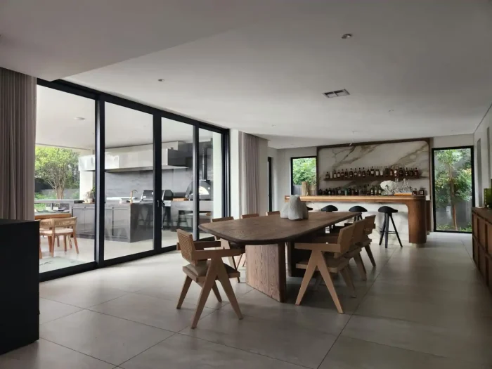 vaga series black aluminium doors luxury interior living space VAGA Series black aluminium sliding doors luxury interior open-plan living dining space